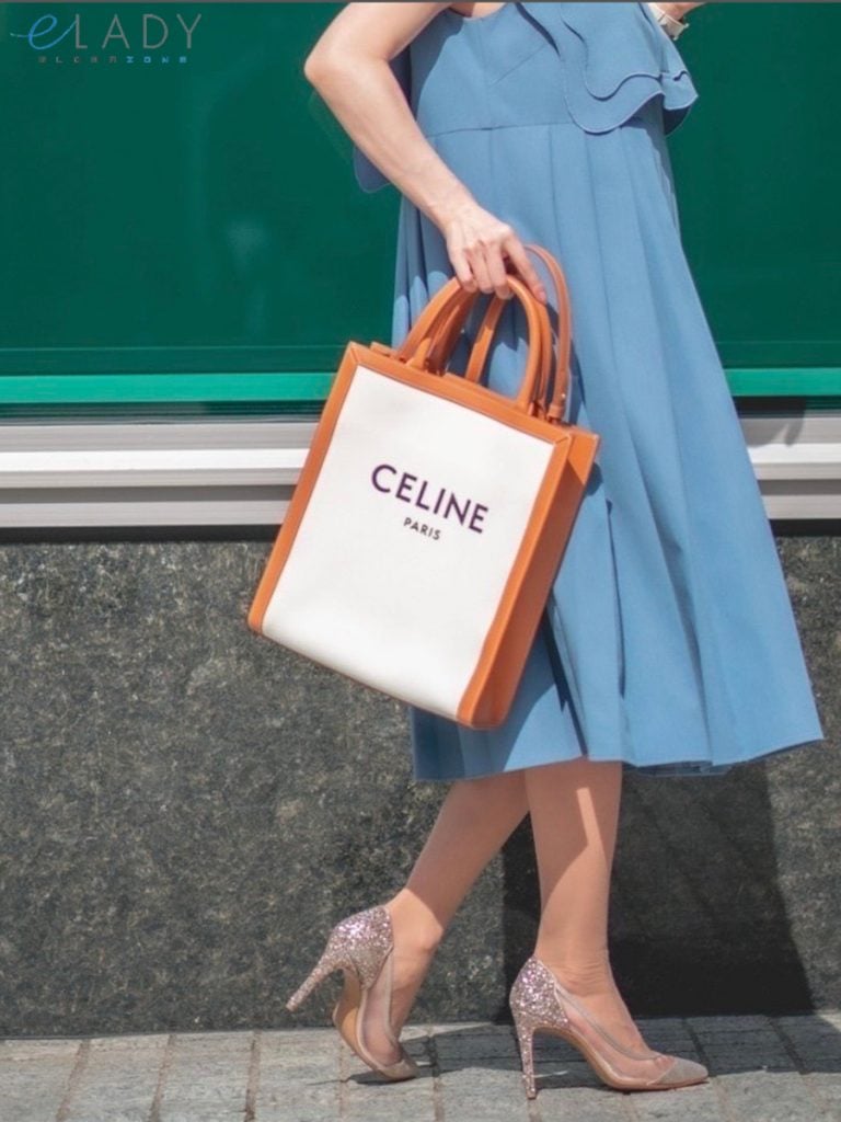 photo of a model carrying a vintage Celine bag